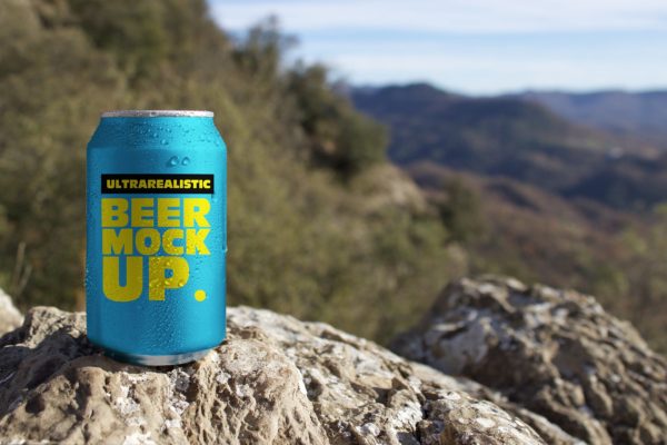 野外岩石场景啤酒易拉罐设计效果图素材天下精选 Nature Beer Can Mockup