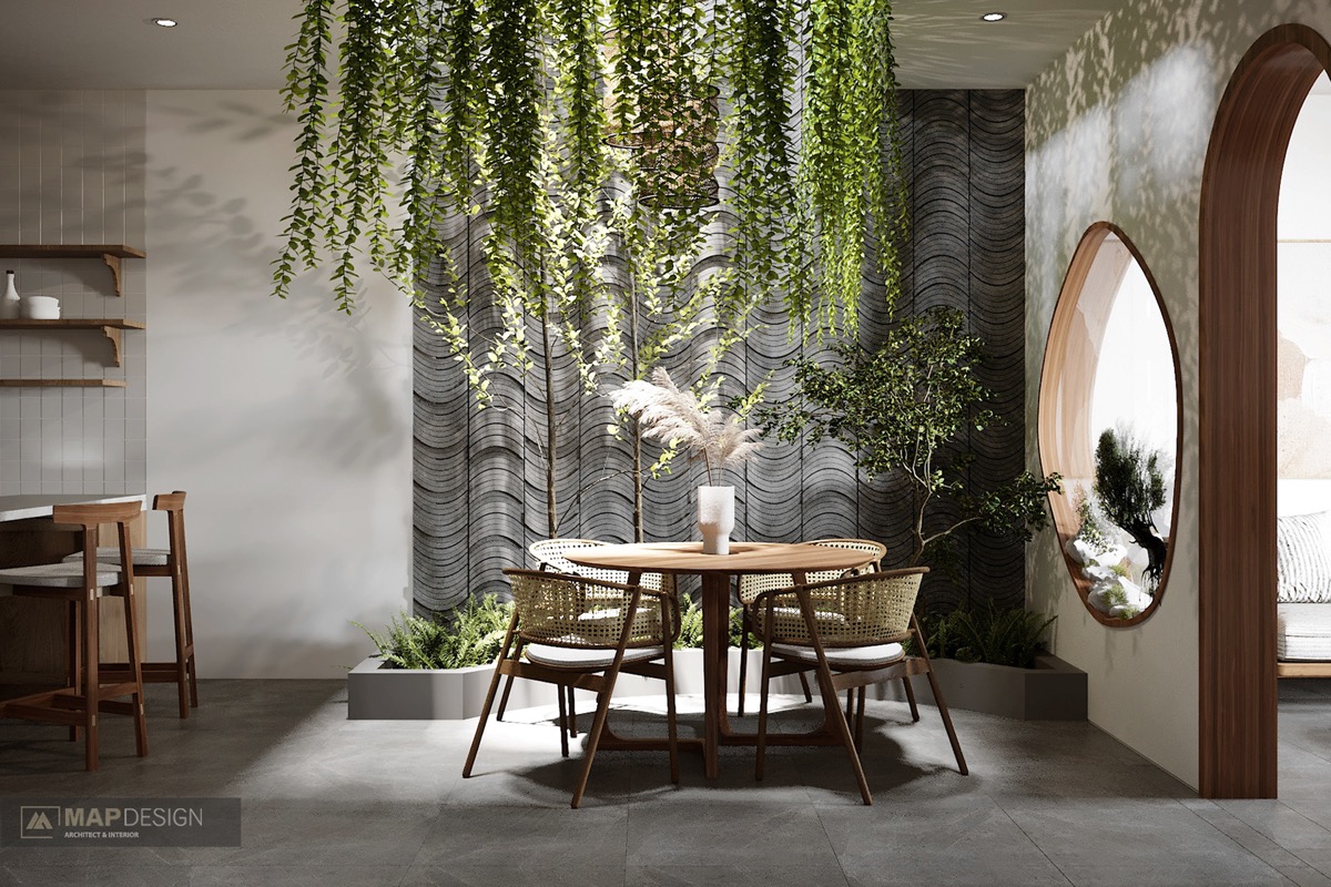拥有室内绿色空间和庭院的精美越南住宅设计